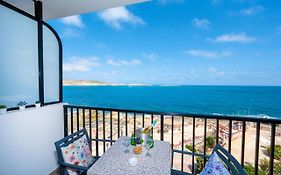 Islet Promenade Seafront 1 Bedroom Apartment With Sea View Balcony By Getawaysmalta